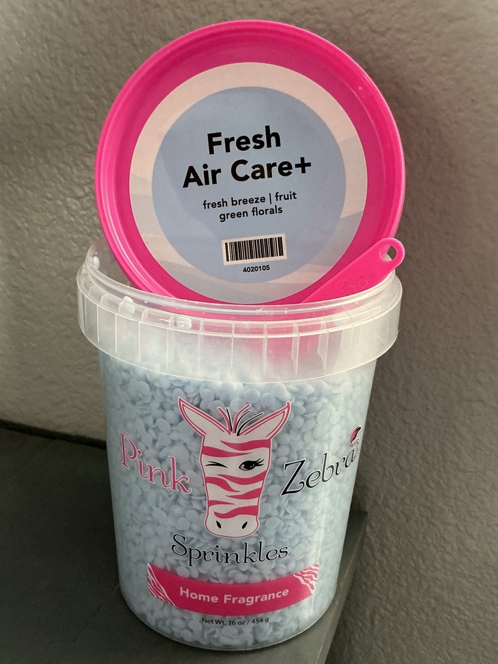 Fresh Air Care+ Pink Zebra Odor-Eliminating Wax Melts in a 4 oz blend bag